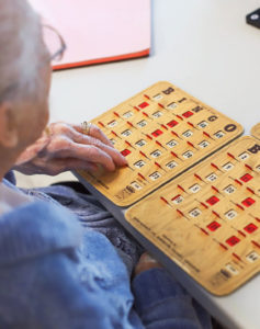 senior woman playing bingo