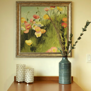beautiful painting of poppies hung on wall
