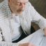 senior man How Much is Old Age Security in Canada form paperwork